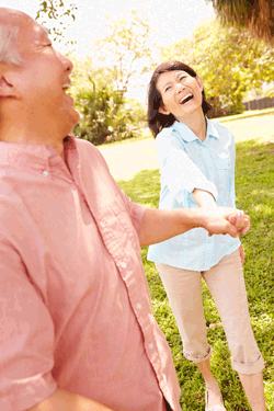 Medicare Couple In Park Couple having fun In the Park