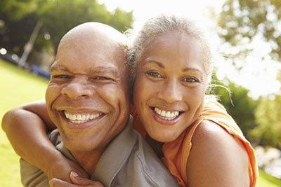 Medicare Couple having fun in the park